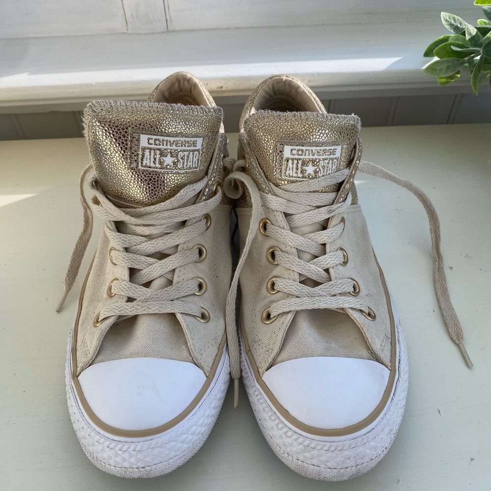 Gold, cream and tan converse chuck Taylor’s low top. Size 10.